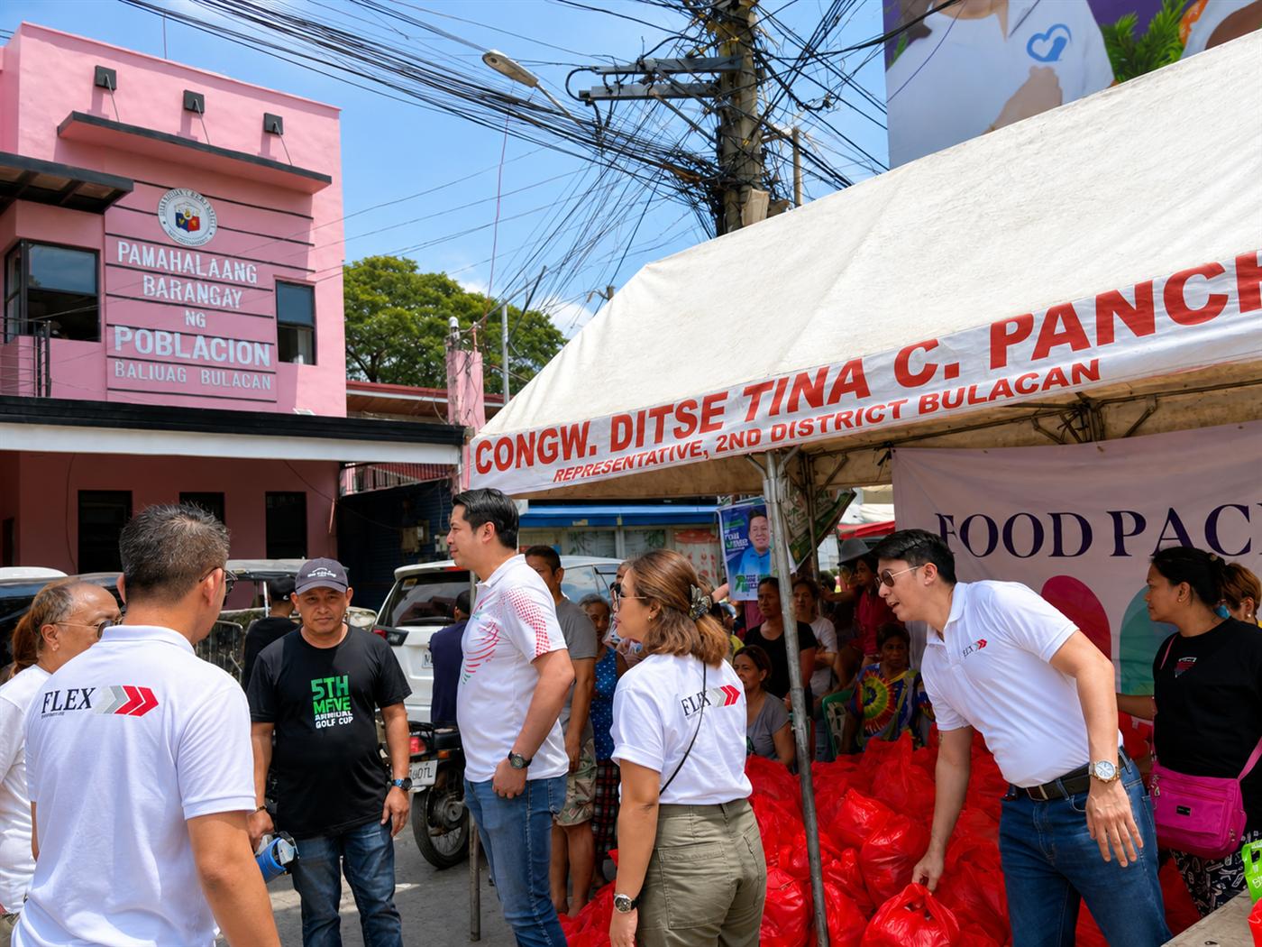 Flex team members coordinating with local barangay leadership on-site