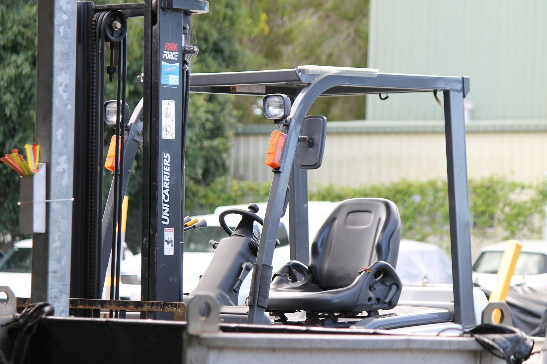 Close-up of a forklift cab, representing capital equipment and machinery